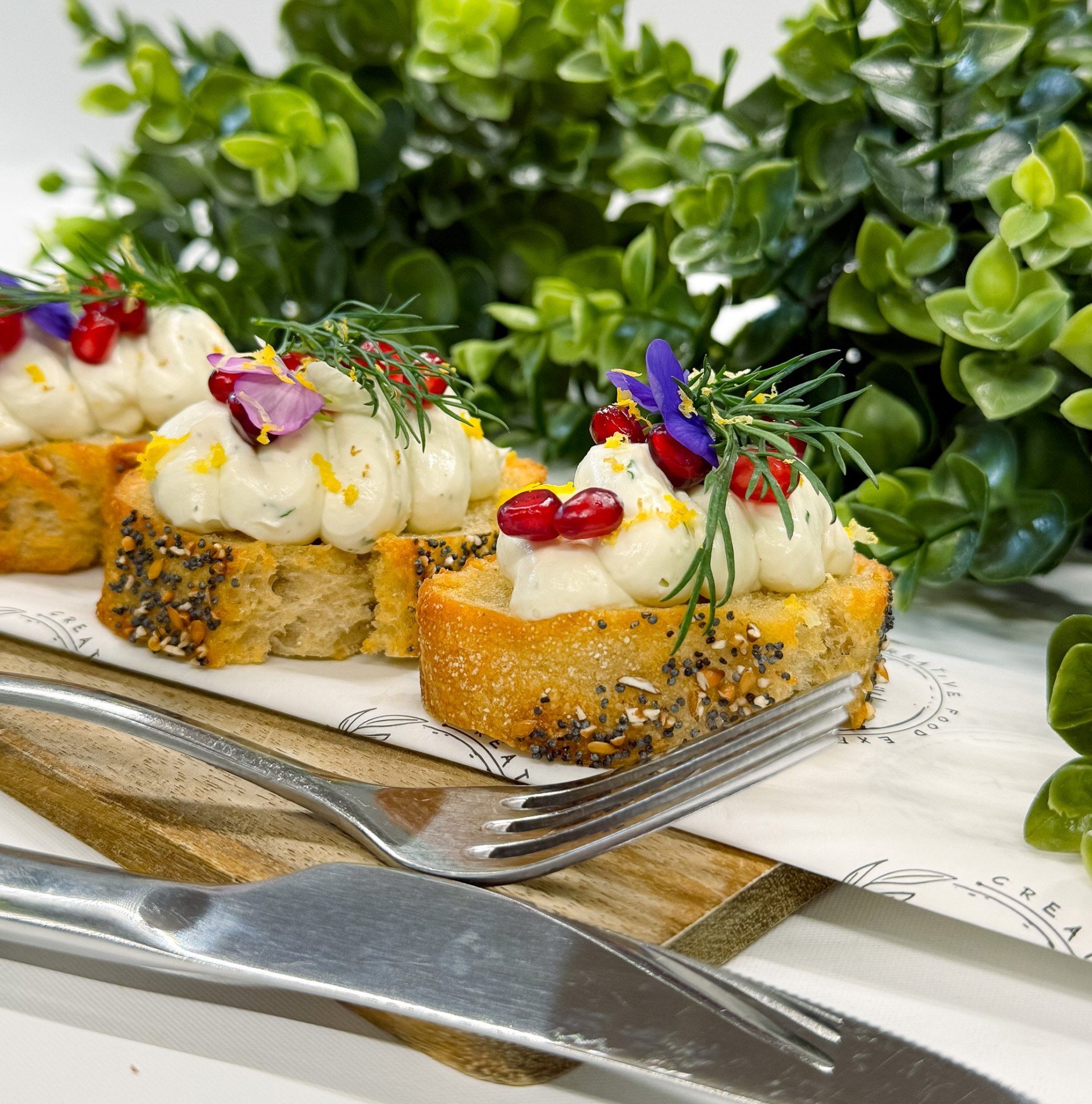 Whipped Artichoke on Rustic Crostini, Pomegranate and Citrus Thyme