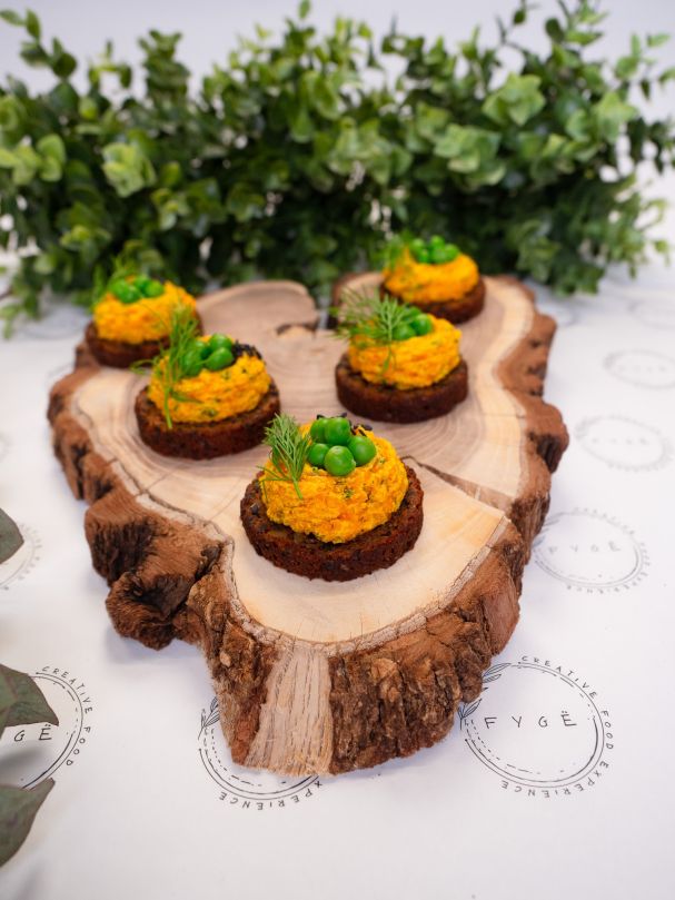 Young Carrot Mousse on Archipelago Bread, Sweet Peas and Fresh Herbs