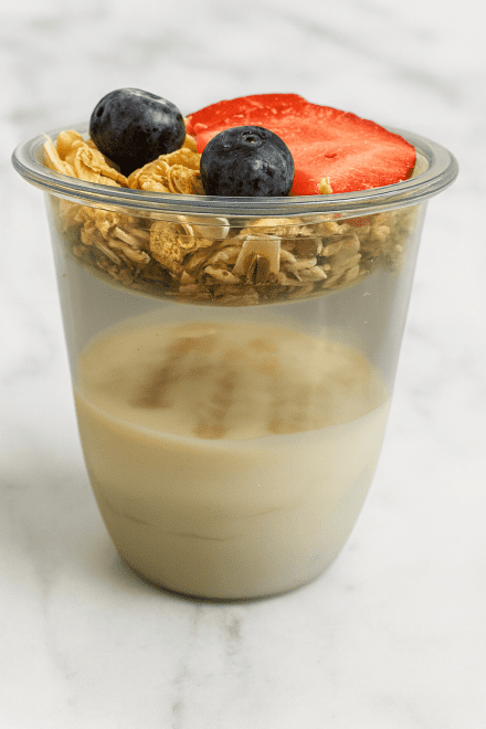 Granola with Greek yogurt, honey and berries