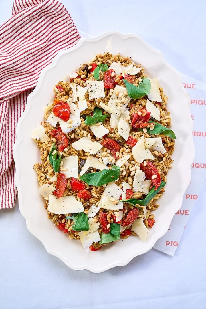 Orzo salad with tomato pesto, roasted aubergine, basil, pine nuts & parmesan