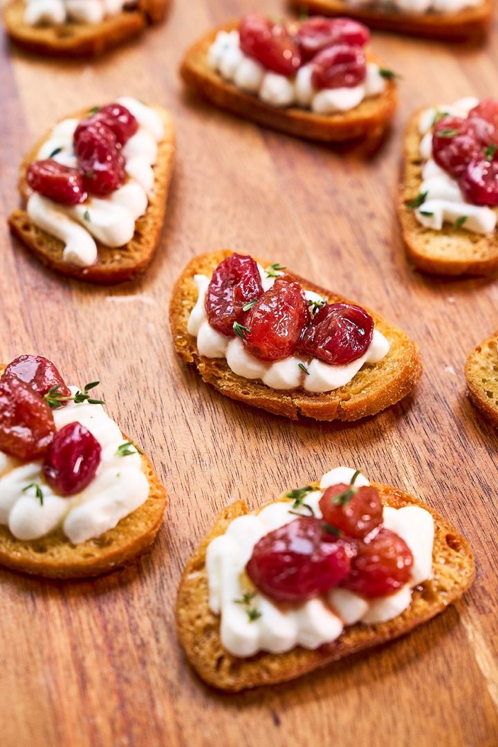 Whipped goat's cheese crostini with thyme roasted grapes & honey