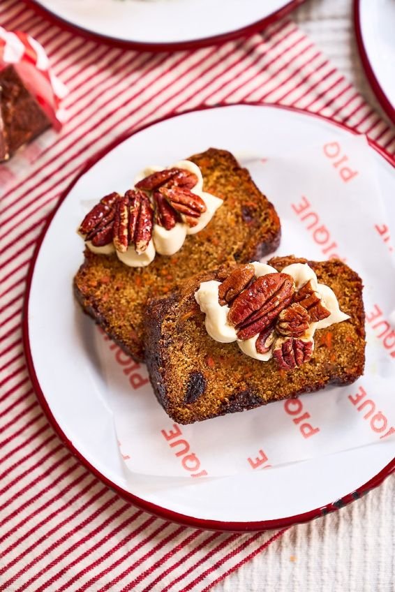 Carrot cake with cream cheese frosting and pecans