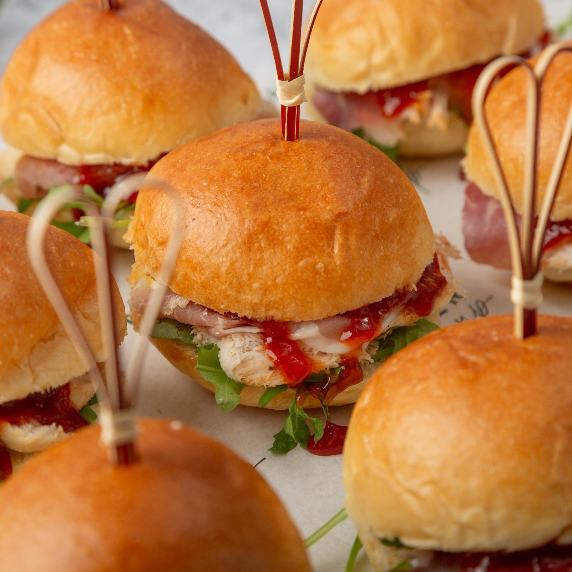 Turkey, Prosciutto, Brie, and Cranberry Sliders - 12