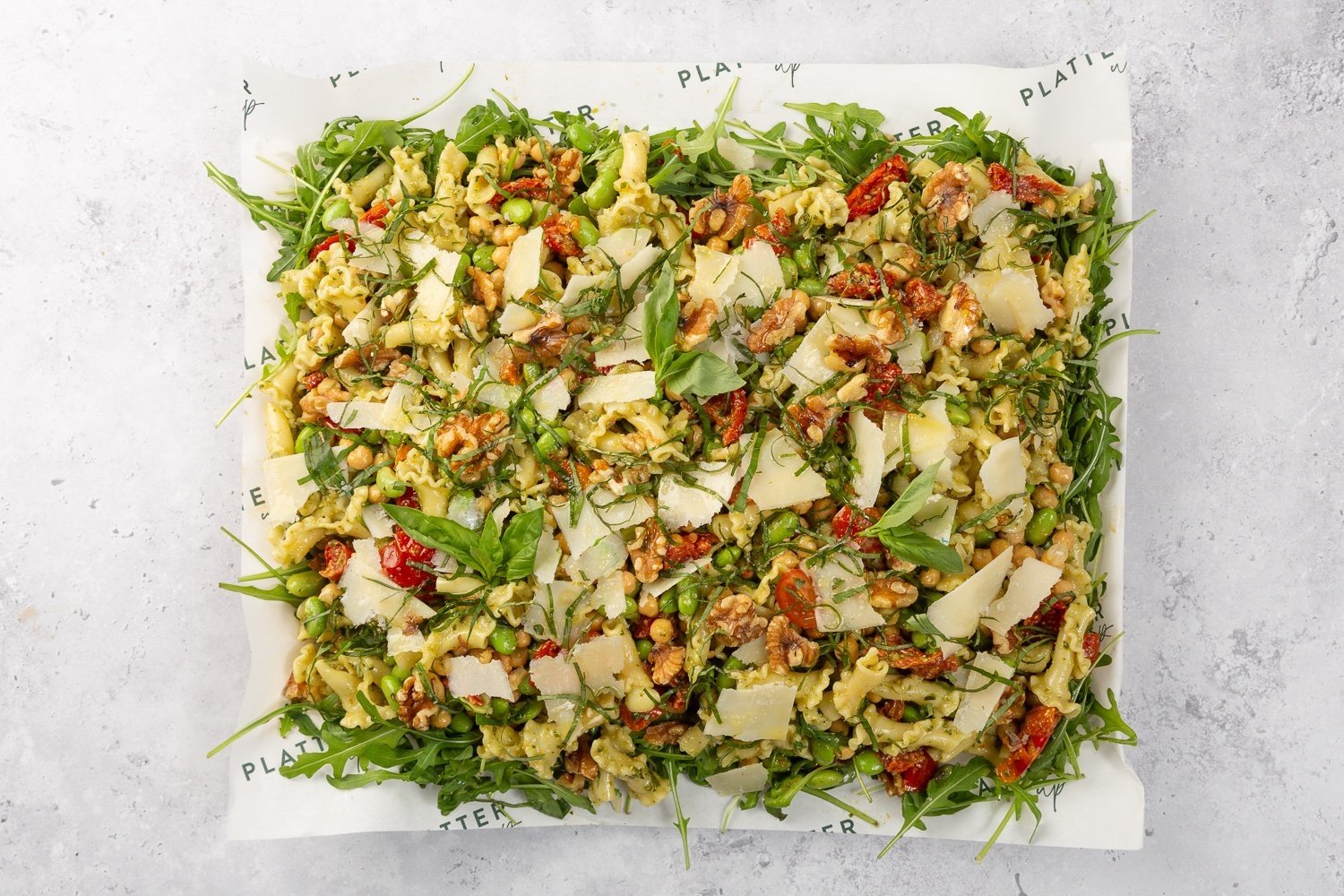 Trofie, Pesto, Sundried Tomatoes, Chickpeas, Broad Beans, and Edamame Salad Platter - Feeds 8