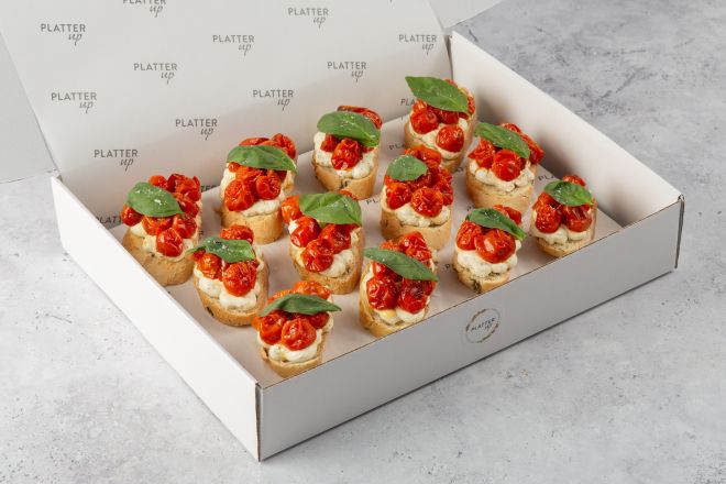 Olive Bread topped with Ricotta and Cherry Tomatoes - 12