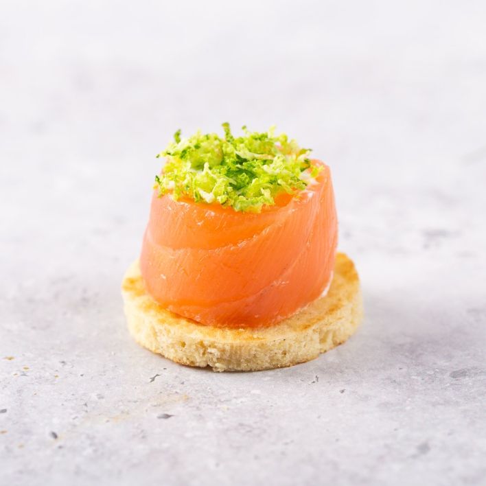 Herby Smoked Salmon Roulade on Fresh Blinis