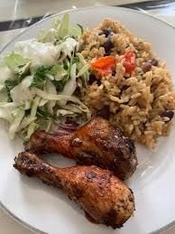 Jerk chicken with wild rice and cabbage